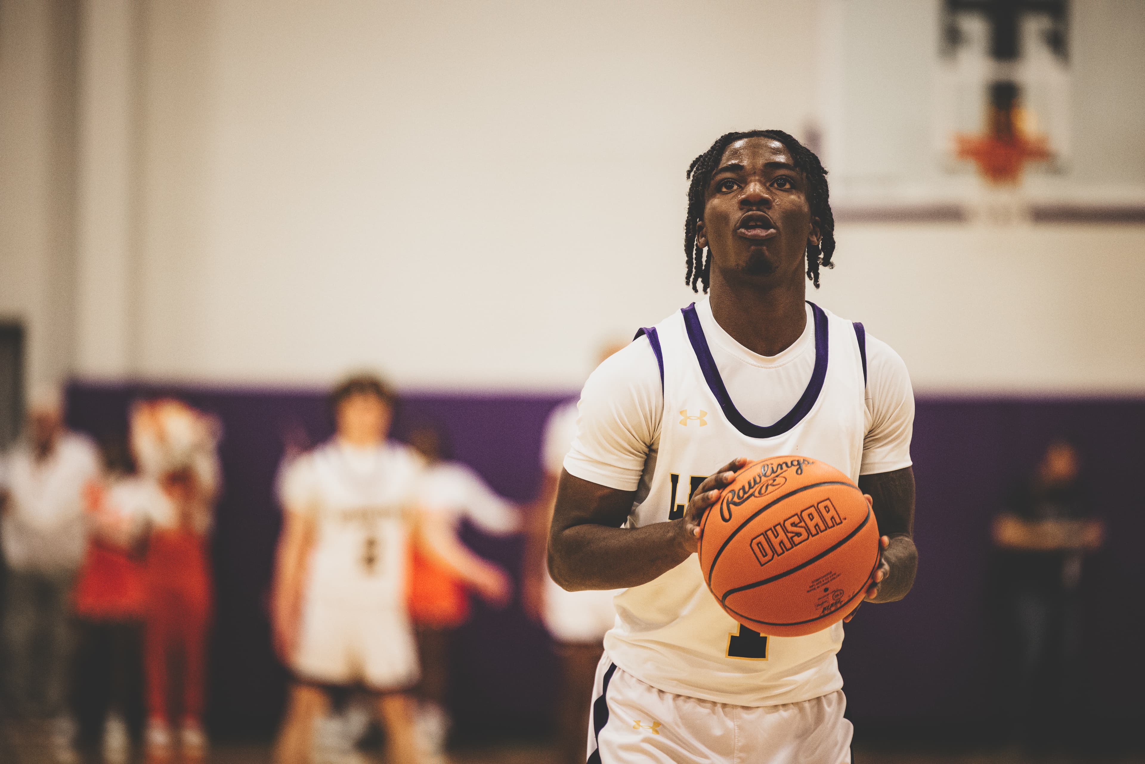 Athlete at the line — pivotal game moment