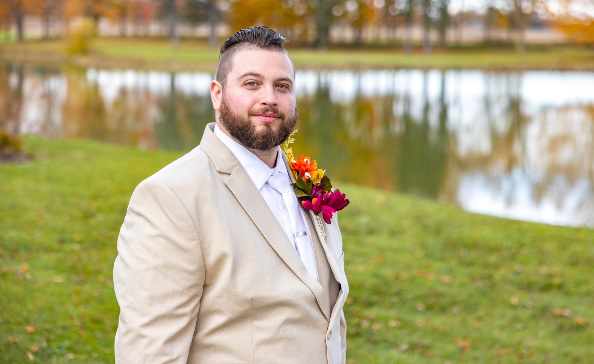 Groom portrait at the lake