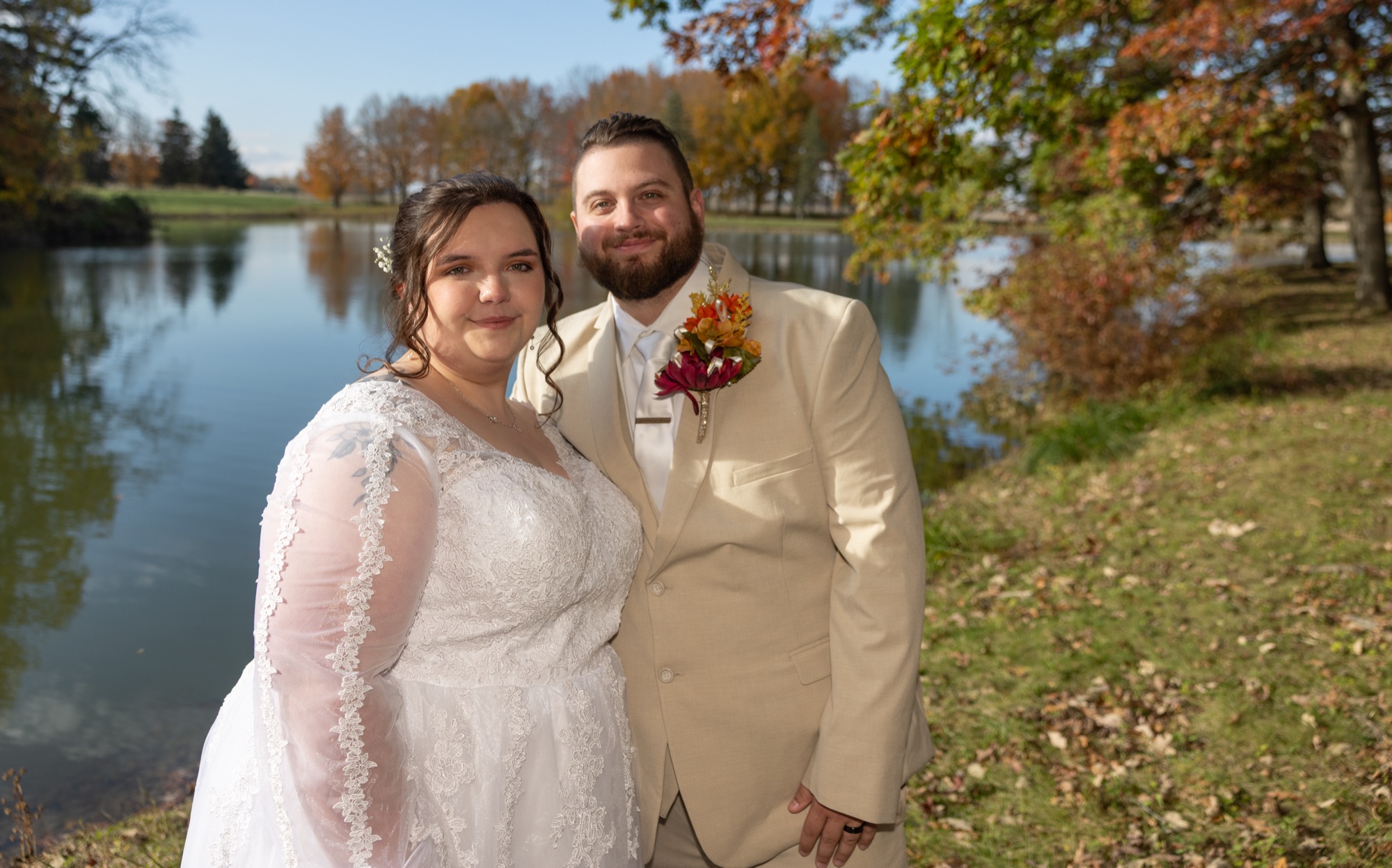 Couple lakeside in fall color