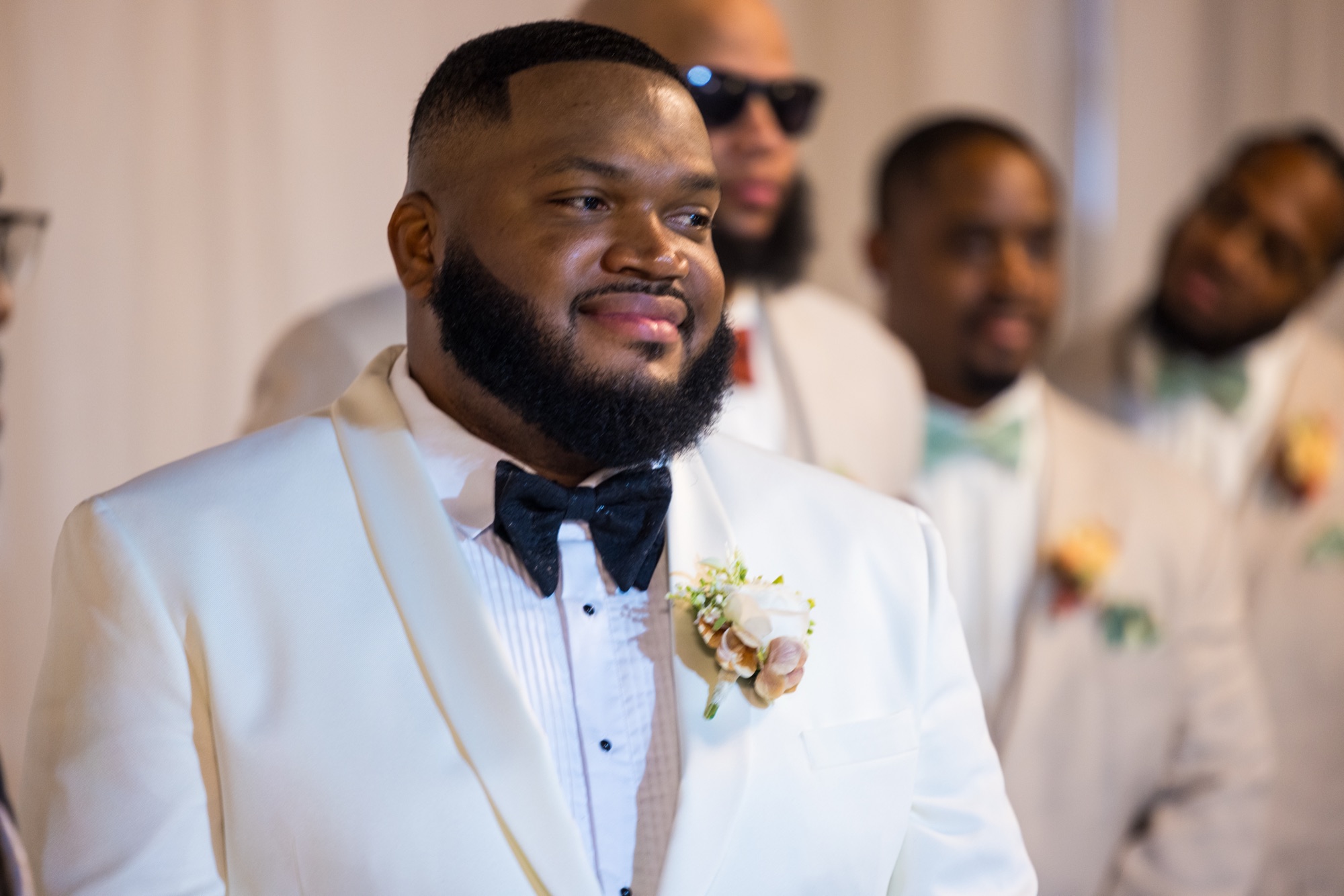 Groom reacting during the ceremony